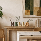 vase on wooden table with plants