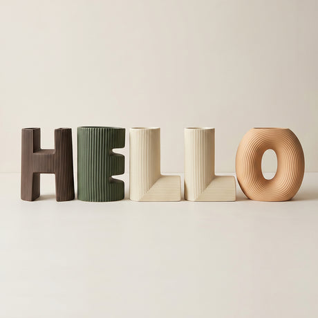 vase with hello wooden letters