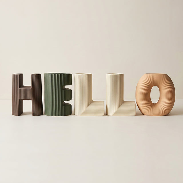 vase with hello wooden letters