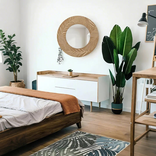 vintage carved wooden round mirror in the bedroom 