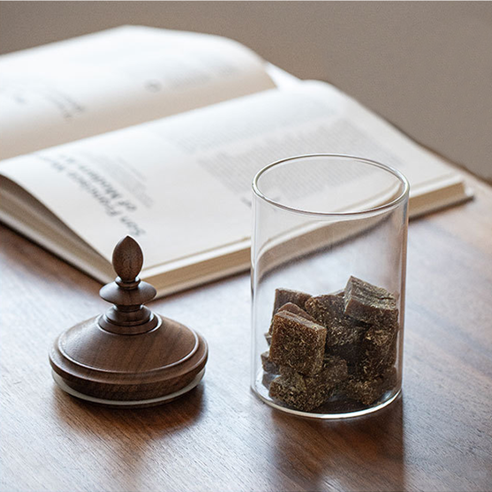 vintage-glass-storage-jar-with-wooden-lid-scene-072201