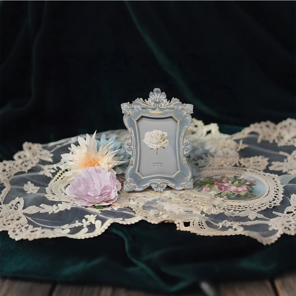 vintage resin blue wall hanging picture frame on the floral cloth