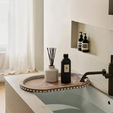 vintage wooden oval decorative storage tray place toiletries in the bathroom