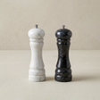 white and black marble salt and pepper mills
