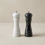 white and black marble salt and pepper mills