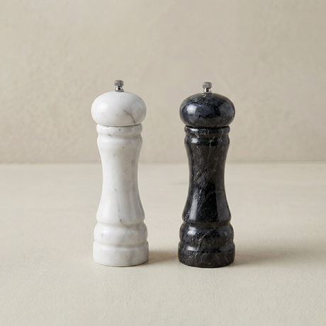 white and black marble salt and pepper mills