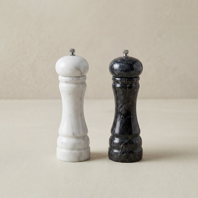 white and black marble salt and pepper mills