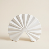 white fan pleated ceramic decor on beige