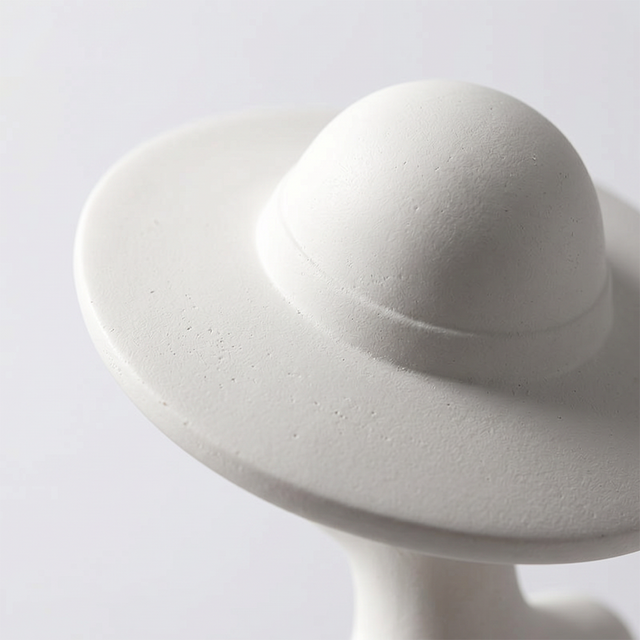 white figurine sun hat texture close up