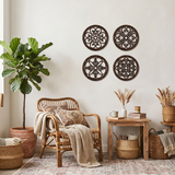 wood wall decor above rattan chair with pampas
