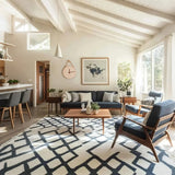wooden decorative wall clock with hanging rope in the living room