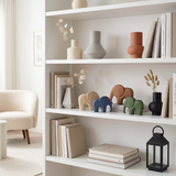 wooden elephants on white shelf with vases
