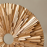 wooden sunburst sculpture texture closeup