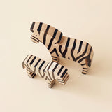 zebra sculpture two facing figures